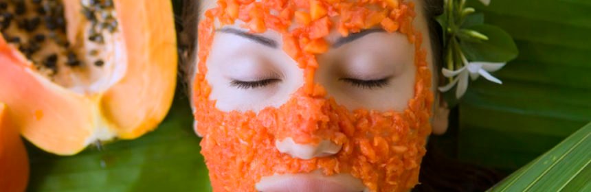 Beautiful woman having Fresh Papaya Facial Mask apply